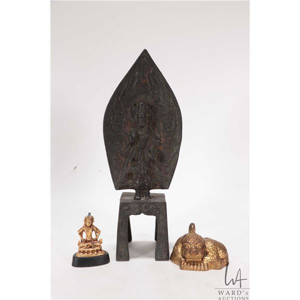 Selection of cast Asian collectibles including archaic buddha 9 1/2" in height, small seated buddha 