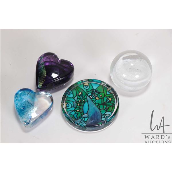Four hand blown art glass paper weights including Caithness and possible unlabeled Robert Held