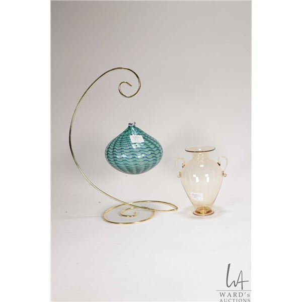 Two pieces of hand blown art glass including delicate Murano Grecian urn and a hanging ornament with