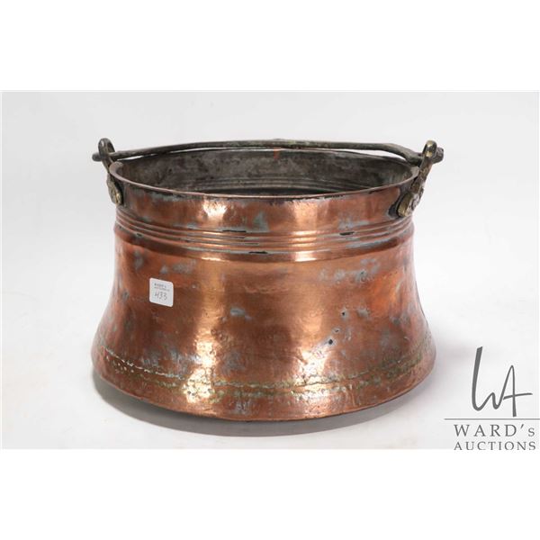 Antique hand hammered copper pot with brass handle, 7" H X 10.5" in diameter
