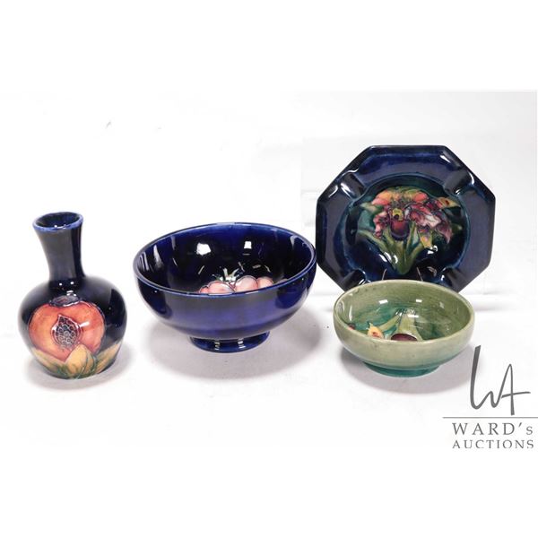 Four pieces of vintage Moorcroft pottery including Anemone 4 1/2" diameter bowl, 3 1/2" pomegranate 
