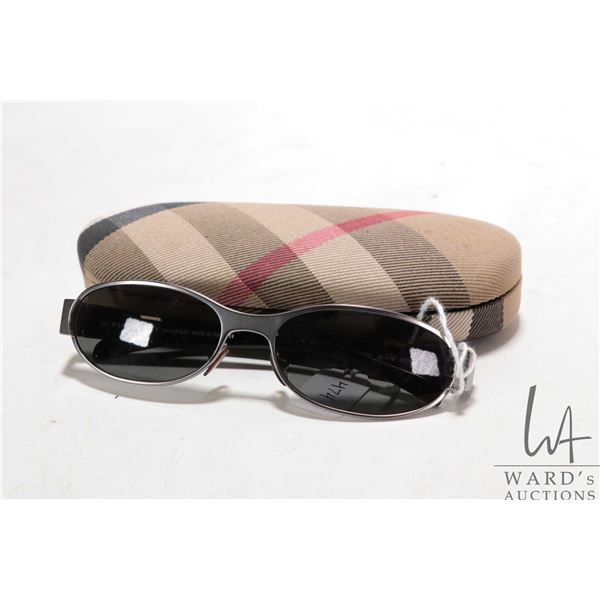 Pair of Burberry branded sunglasses with case. Note: buyer to satisfy themselves as to authenticity