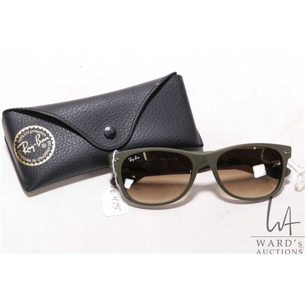 Pair of sunglasses marked Ray Ban, in wayfarer G-15 green, Note: buyer to satisfy themselves as to a