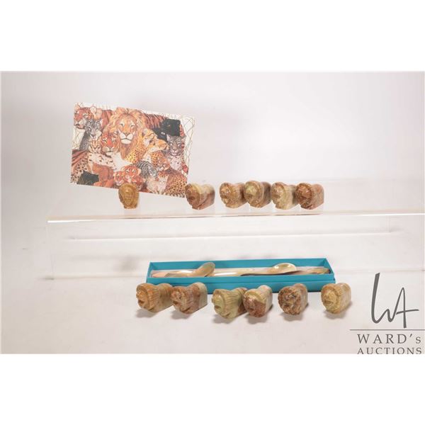 Twelve carved Indian soapstone card holders and a selection of carved horn utensils etc.