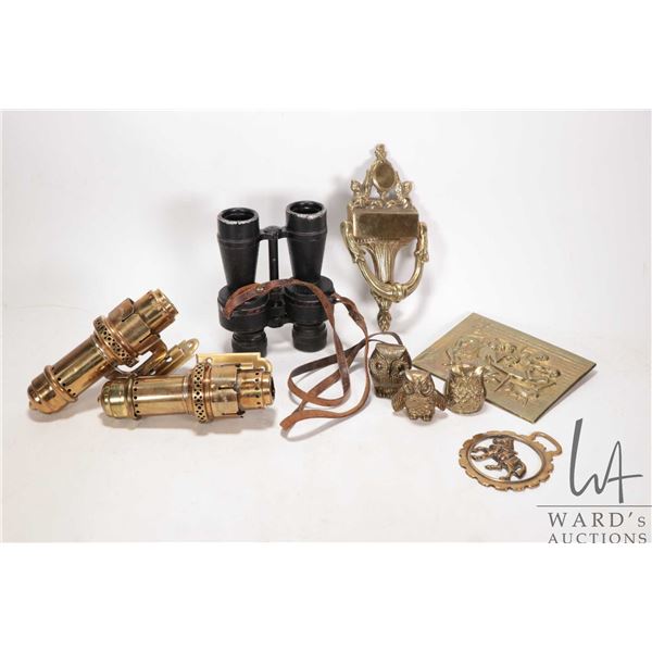 Selection of brass collectibles including a pair of brass wall mount candle sconces, a bas relief ca