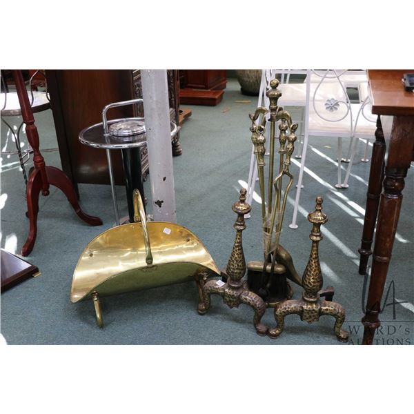 Four piece brass fireside companion set with a pair of matching andirons and a brass log holder