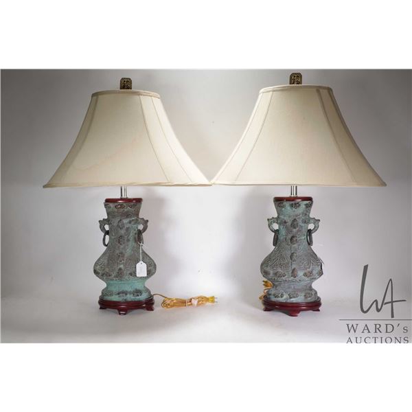 Pair of Chinese archaic-style bronze table lamps with shades, approximately 29" in height