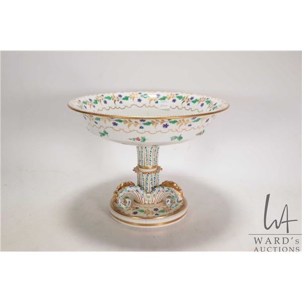 Antique hand painted center bowl with raised pedestal stem and delicate flowers and gold decoration,