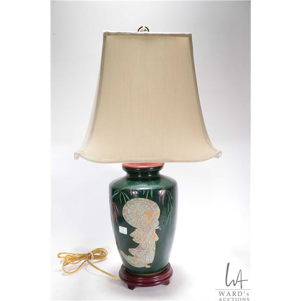 Glazed ceramic ginger jar style table lamp with geisha motif figure and pagoda style shade, 27" in h