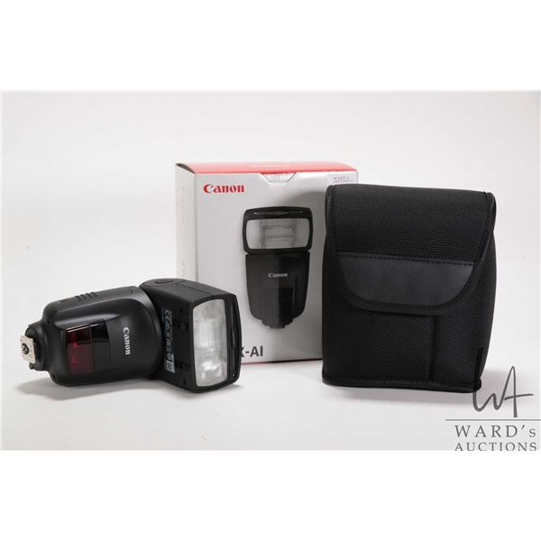 Canon Speedlite 470EX-A1 flash, new in box with accompanying packaging