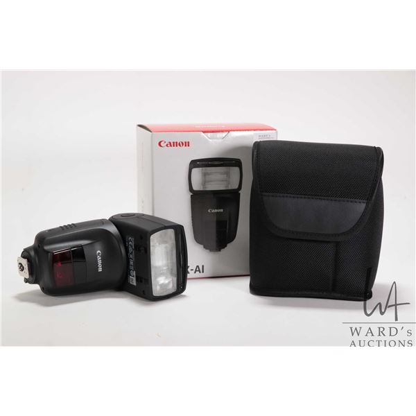 Canon Speedlite 470EX-A1 flash, new in box with accompanying packaging