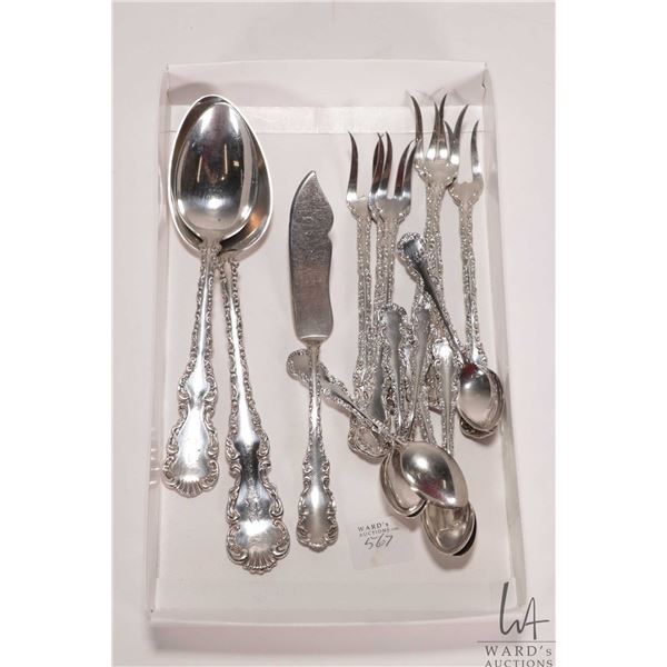 Selection of sterling silver flatware including Louis XV patterned serving spoon, tablespoon, spread