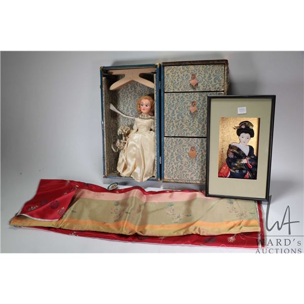 Vintage metal doll trunk with drawers and hangers, hard plastic bride doll, framed picture of a geis