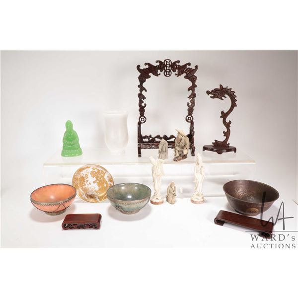 Selection of Oriental cabinet pieces including two sone dishes, bronze dish, jade/ jade like buddha,