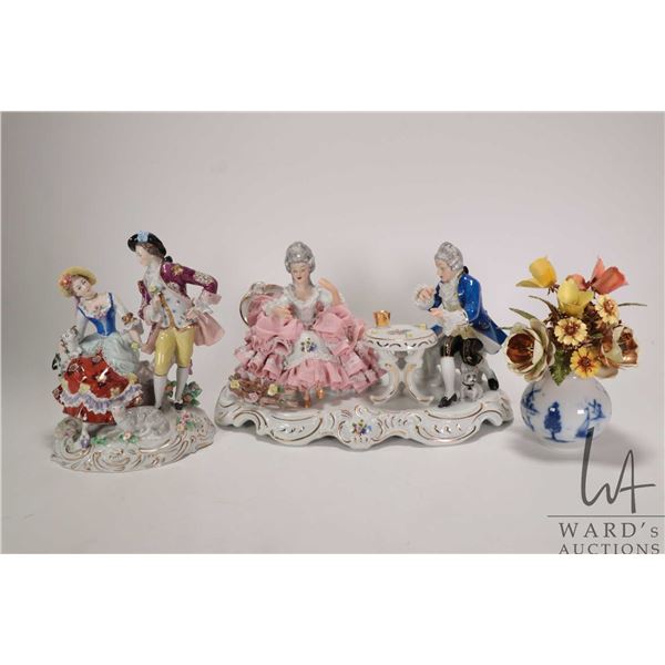 Two Dresden figurines of courting couples 7 1/4" and 6 3/4" plus a The Royal Dutch Bouquet with hand