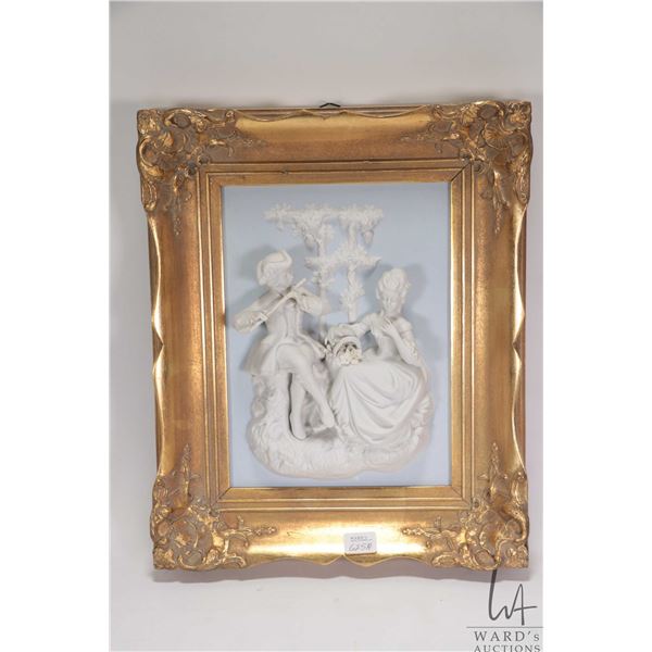 Gilt framed Meissen/ Dresden style 3d porcelain relief wall plaque with Rococo style lovestory theme