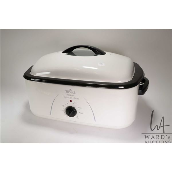 Rival 20 quart roaster oven with buffet server, includes manual and appears unused