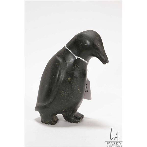 Inuit soapstone carving of a penguin with original Canada Eskimo Art label, no artist signature seen