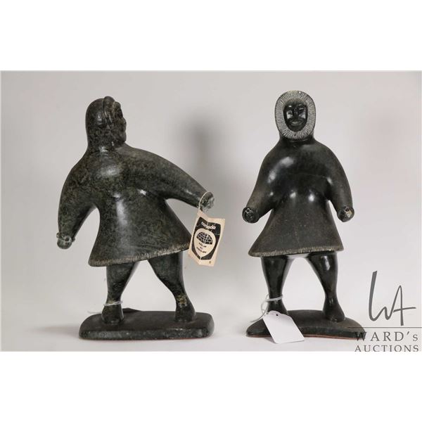 Jim Raddi, Tuktoyaktuk N.W.T., two hand carved Inuit hunters including one retaining it's original E