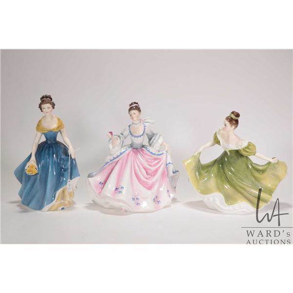 Three Royal Doulton figurines including Lynne HN2329, Melanie HN2271 and Rebecca HN2805