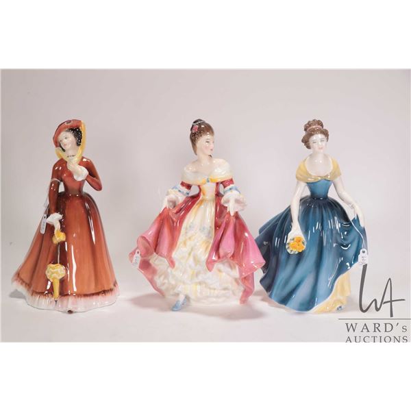 Three Royal Doulton figurines including Julia HN2705, Southern Belle HN2229 and Melanie HN2271