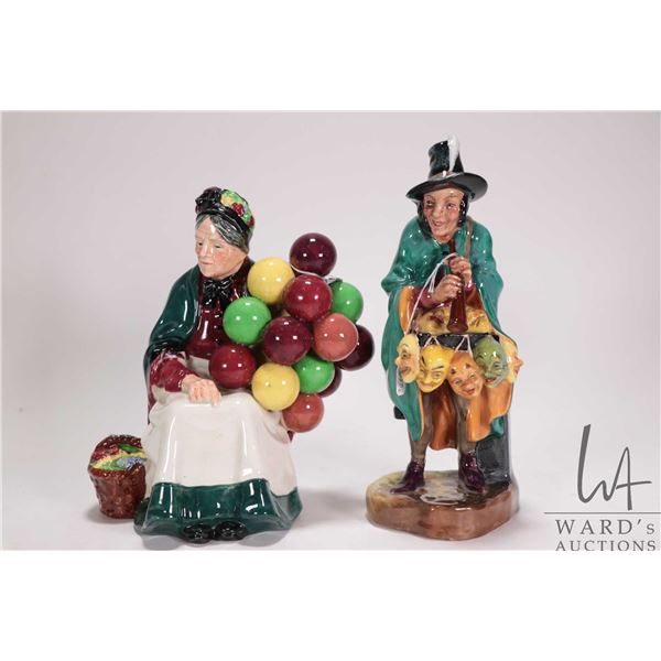 Two Royal Doulton figurines including The Mask Seller HN2103 and The Old Balloon Seller HN1315
