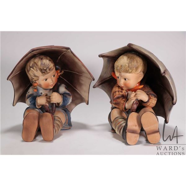 Two large Hummel figurines including Umbrella boy and Umbrella girl