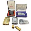 Image 1 : Five Vintage Ronson Varaflame Butane Pocket Lighters, Two Cases & Cylindrical Accessory