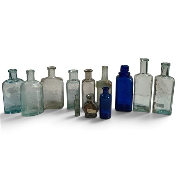 Group of 12 Embossed Apothecary, Medicine & Cosmetic Glass Bottles, Aqua & Cobalt
