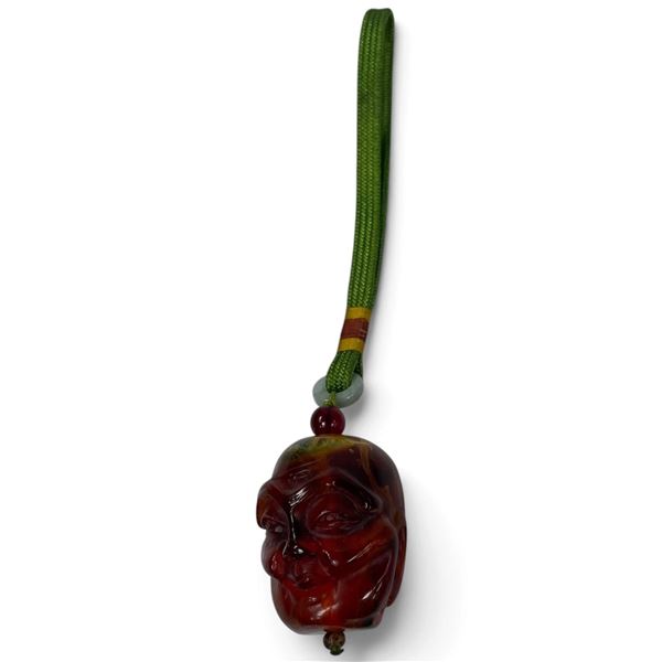 Chinese Carved Red-Amber Style Arhat Pendant on Jade Bail & Green Cord (Head is 2" long and 1.5" dia