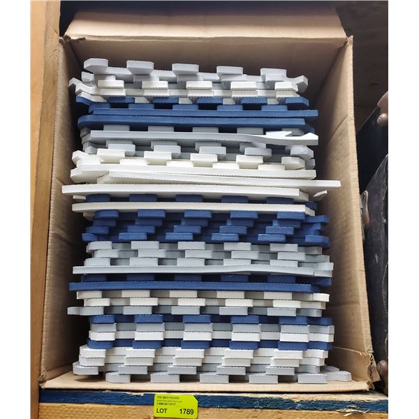 Stack of 12" x 12" Interlocking Rubber Tiles