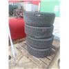 Image 1 : 4 Tires on GMC Rims – 275/55R20