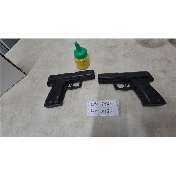 Two H&K USP Airsoft Pistols and Bottle of Yellow Pellets