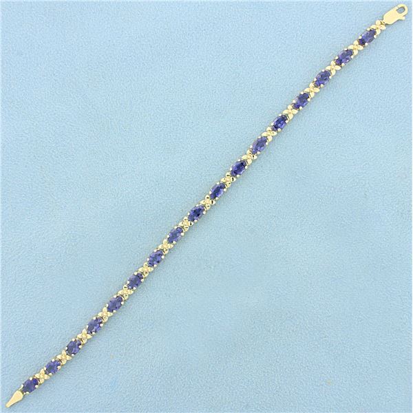 AAA Tanzanite Flower Design Line Bracelet in 14K Yellow Gold