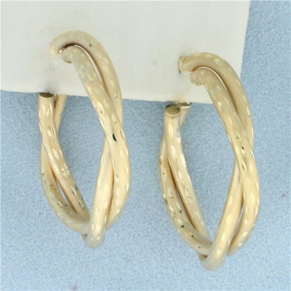 Diamond Cut Satin Finish Twisting Hoop Earrings in 14k Yellow Gold