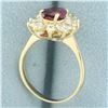 Image 3 : Pear Cut Ruby and Diamond Halo Ring in 14k Yellow Gold