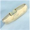 Image 1 : Etched Stripe Design Bangle Bracelet in 10k Yellow Gold