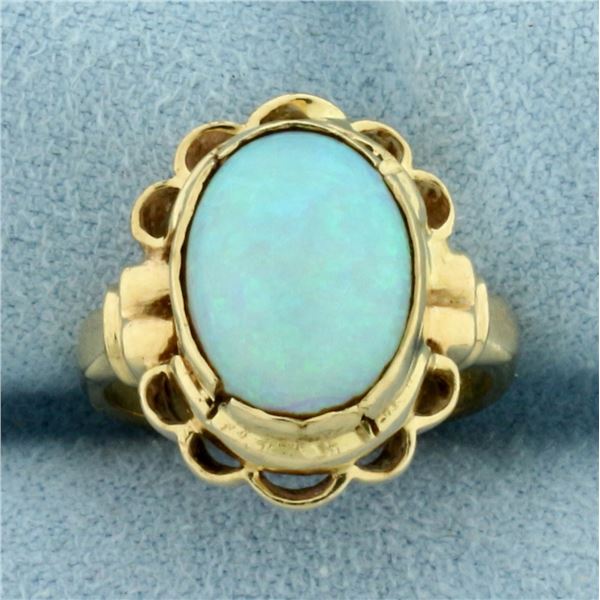 Opal Solitaire Ring in 14k Yellow Gold