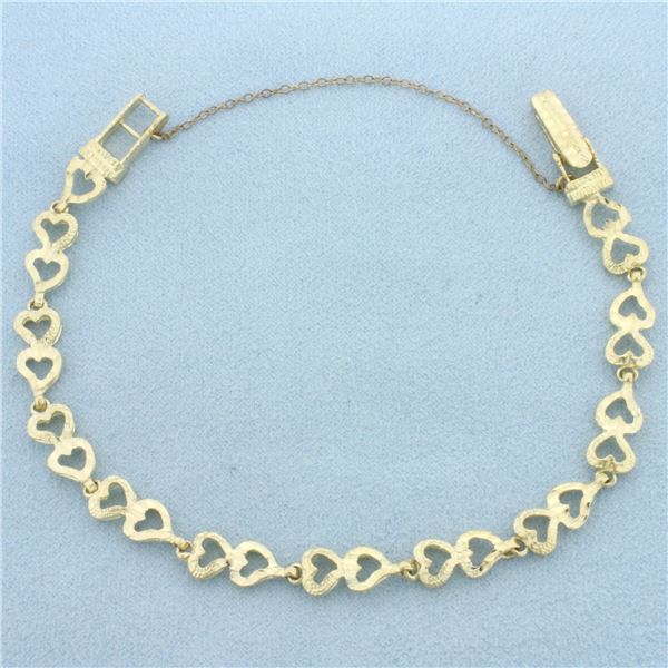 Diamond Cut Heart Link Bracelet in 10k Yellow Gold