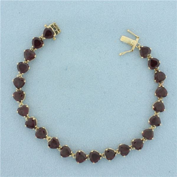 Heart Cut Garnet Tennis Bracelet in 10K Yellow Gold