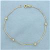 Image 1 : Ball Bead Station Bracelet in 18k Yellow Gold