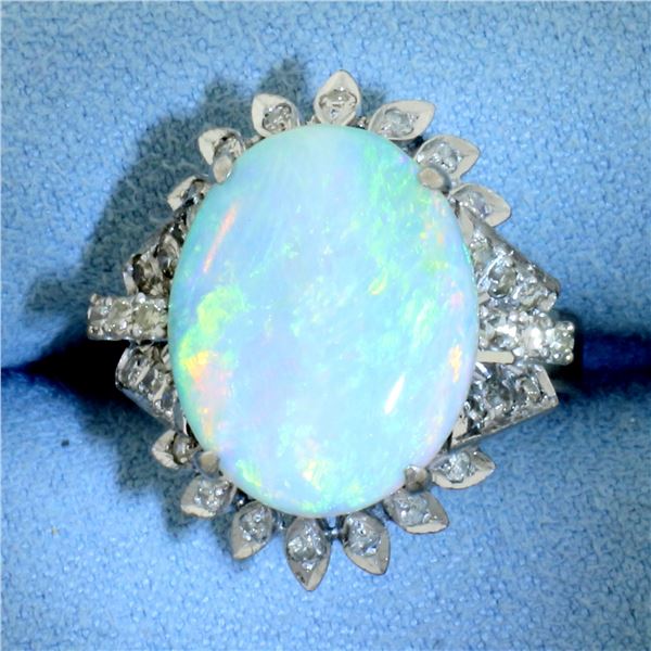 Opal and Diamond Halo Ring in 18k White Gold