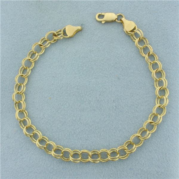 Double Loop Charm Bracelet in 14K Yellow Gold
