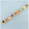 Image 2 : Multi Gem Hand Carved Cameo Bracelet in 18k Yellow Gold