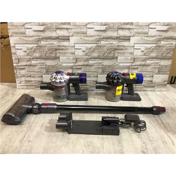 Lot Of 2 Dyson Vacuums - With An Attachment