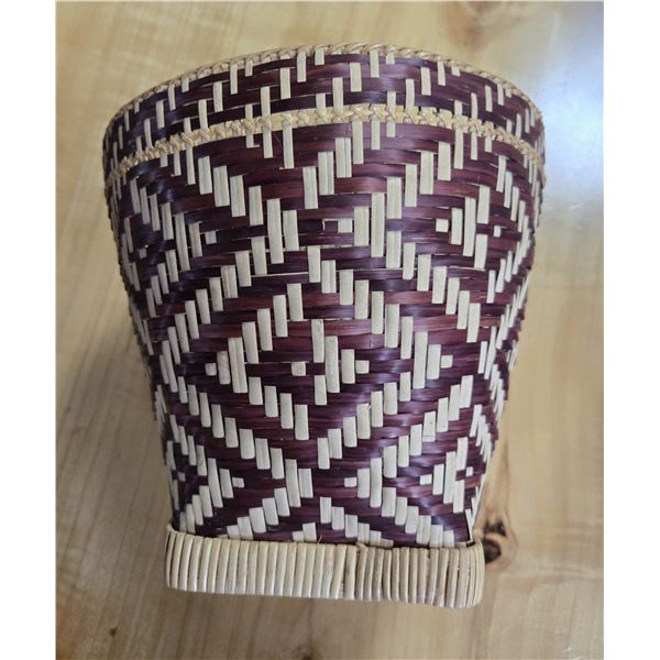 Signed woven  basket