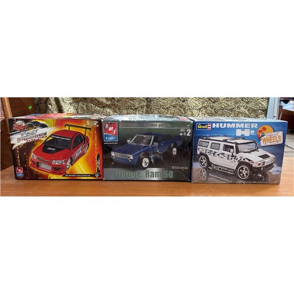 3 Unassembled Car Model Kits – AMT and Revell