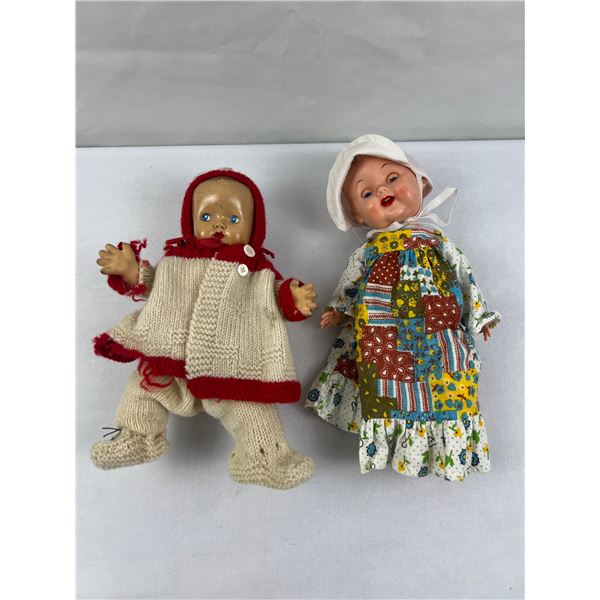 pair of vintage baby dolls
