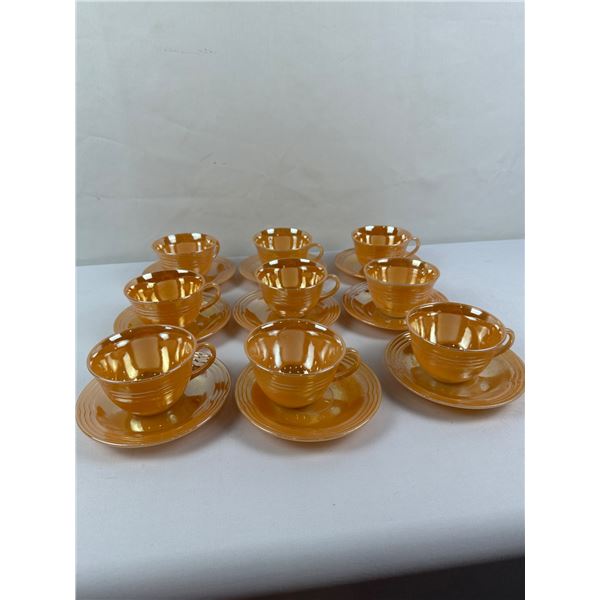 Set of 9 Vintage Fire-King Tea Cups/Saucers in the Peach Lustre Three Band Pattern