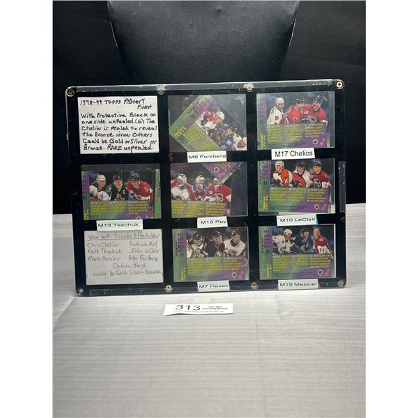 Display of 7 1998-99 Topps Mystery Finest Hockey Cards